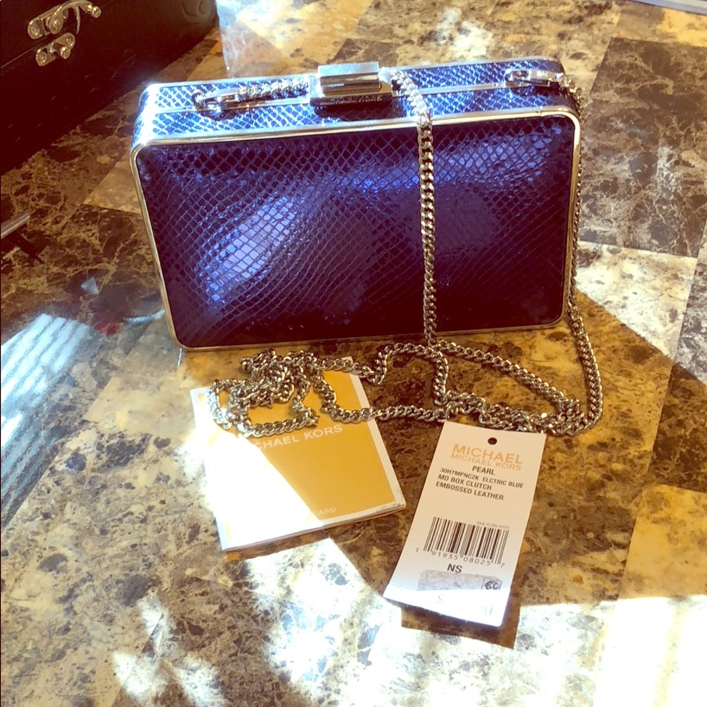 Michael Korea’s Electric Blue Leather Clutch